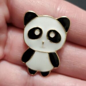 Gold tone black and white panda brooch
